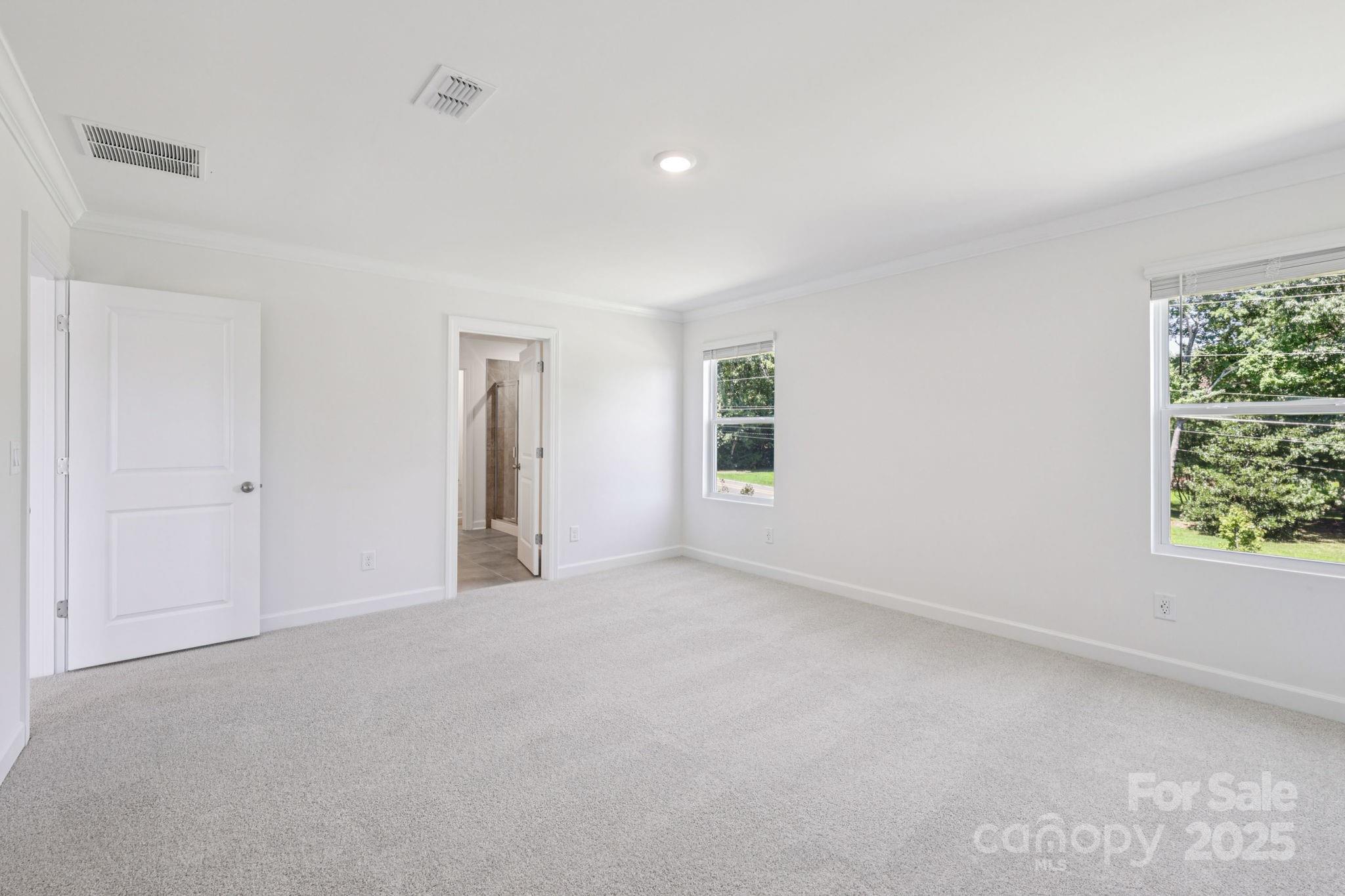 161 Murphy Mdw Road Mocksville, NC 27028 - Photo 21 of 29 an empty room with windows and closet