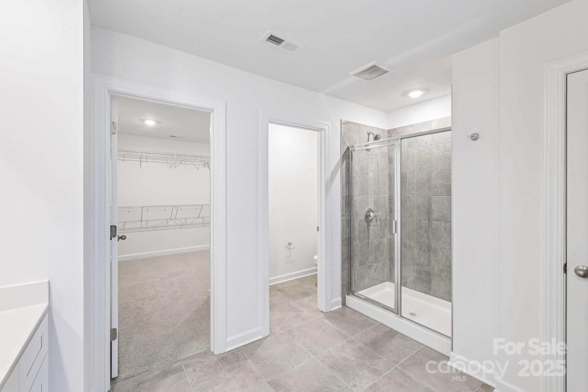 161 Murphy Mdw Road Mocksville, NC 27028 - Photo 25 of 29 a bathroom with a shower and closet