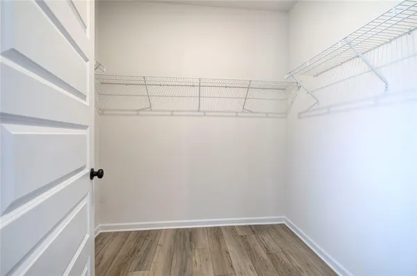 a view of a room with racks on the wall