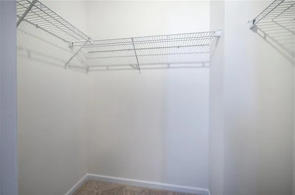 a view of a room with racks on the wall
