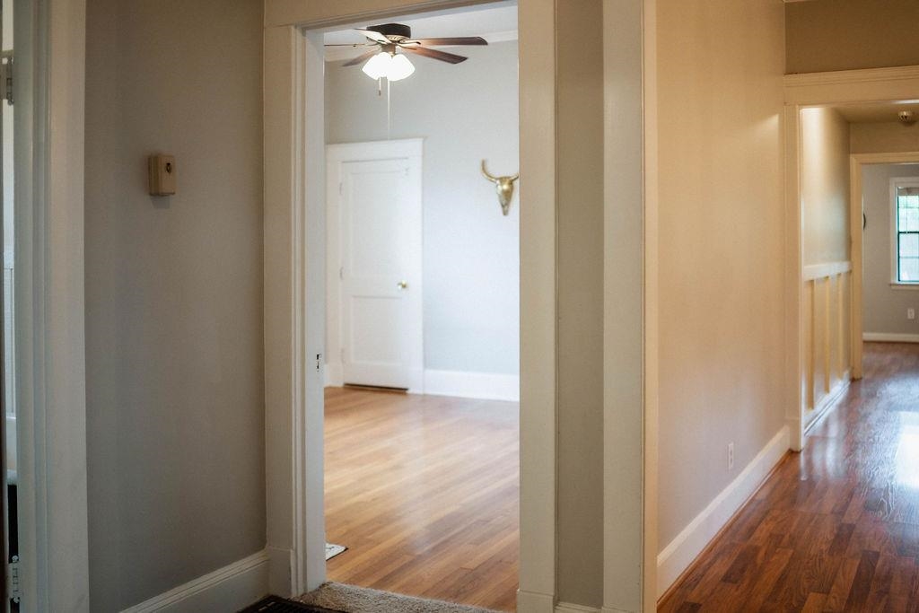 1925 Nelson Avenue Memphis, TN 38104 - Photo 28 of 39 Hallway looking towards bedroom 4 and primary bedroom