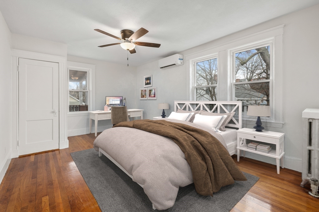 27 Union Street, Unit 3 Boston, MA 02135 - Photo 22 of 28 a bed room with a bed and a window