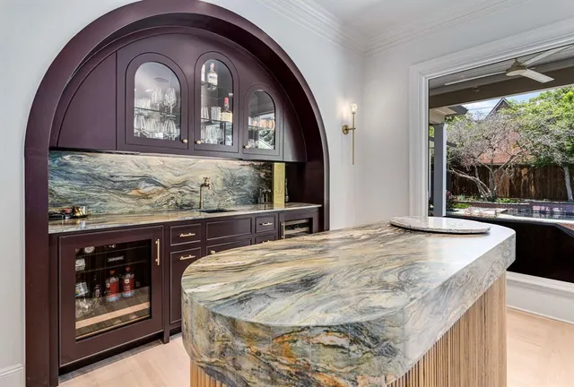 a bed with a balcony view