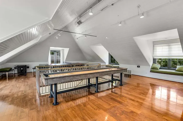 a room with furniture and a wooden floor