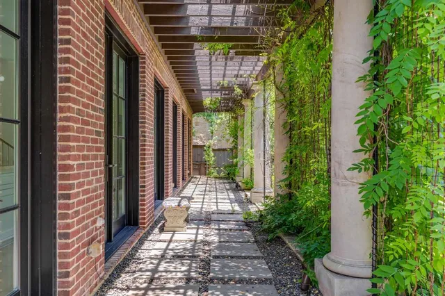 a view of a back yard from a balcony