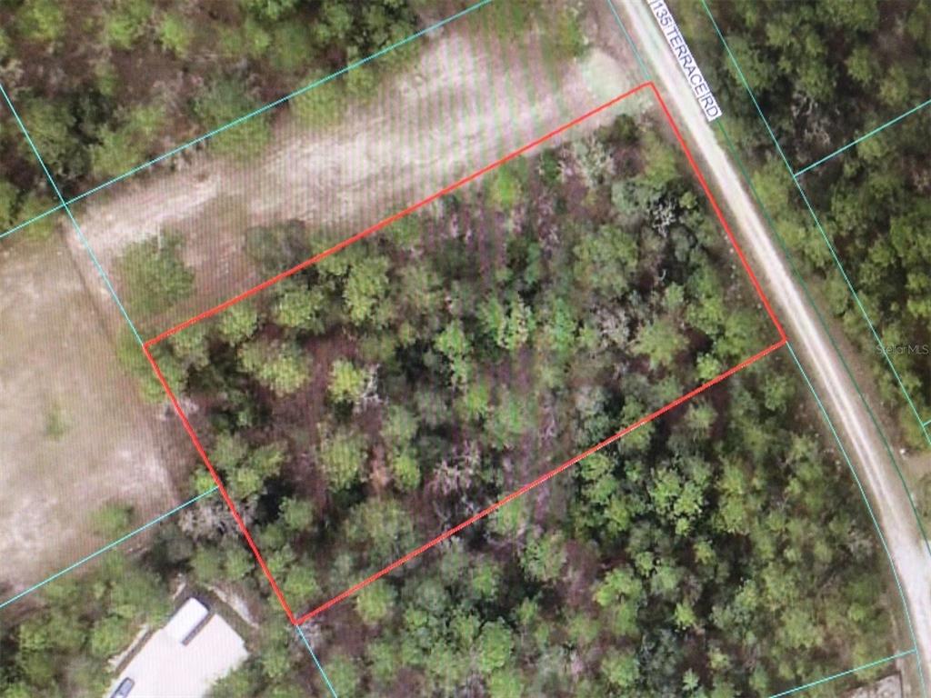 0 Southwest 135th Terrace Road Ocala, FL 34481 - Photo 1 of 1 a view of a garden from a balcony