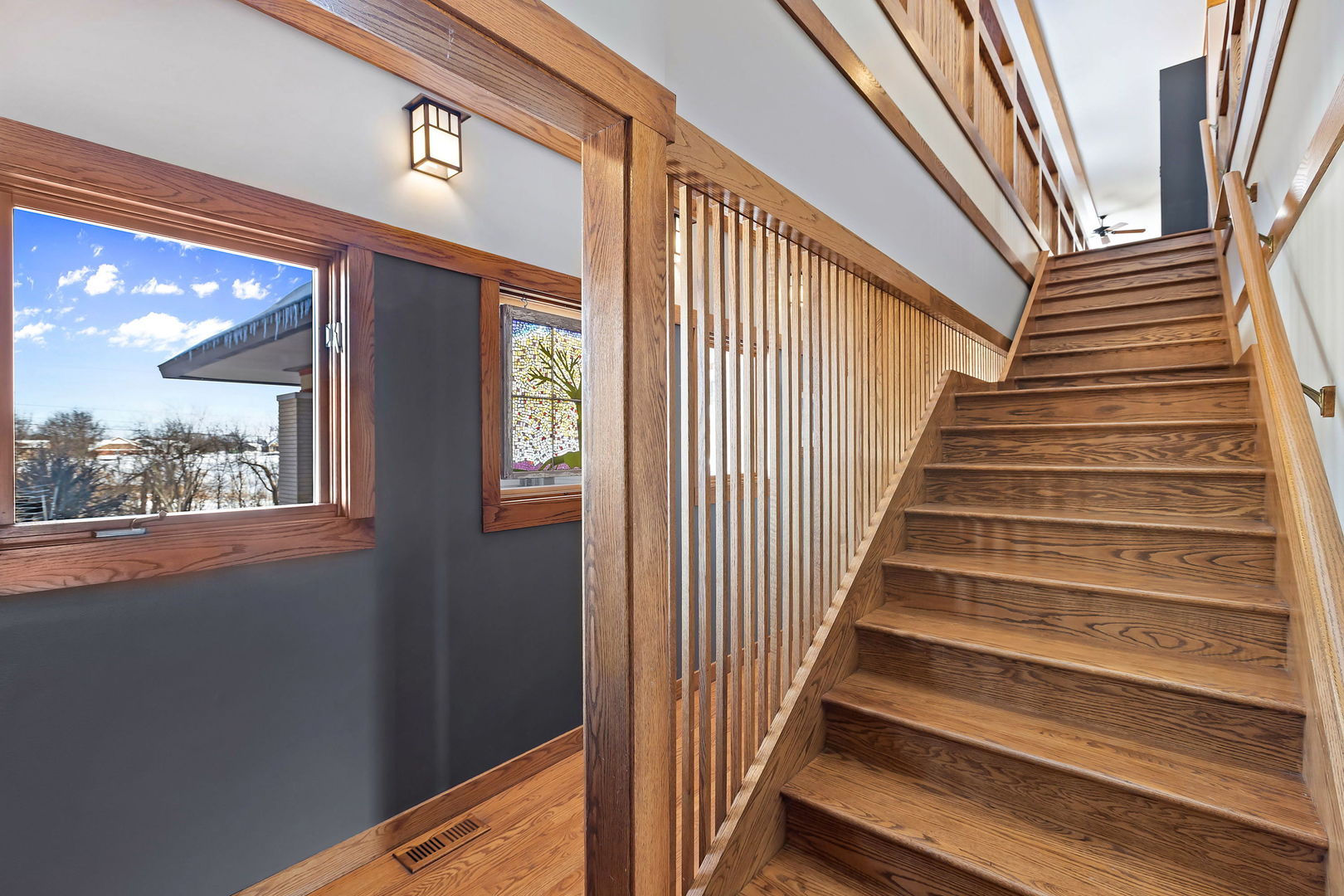 13540 McCarthy Road Lemont, IL 60439 - Photo 18 of 71 a view of entryway with wooden floor and a front door