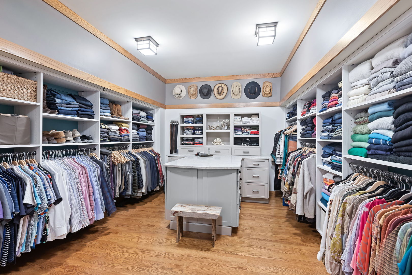 13540 McCarthy Road Lemont, IL 60439 - Photo 32 of 71 a view of walk in closet with clothes and shoes