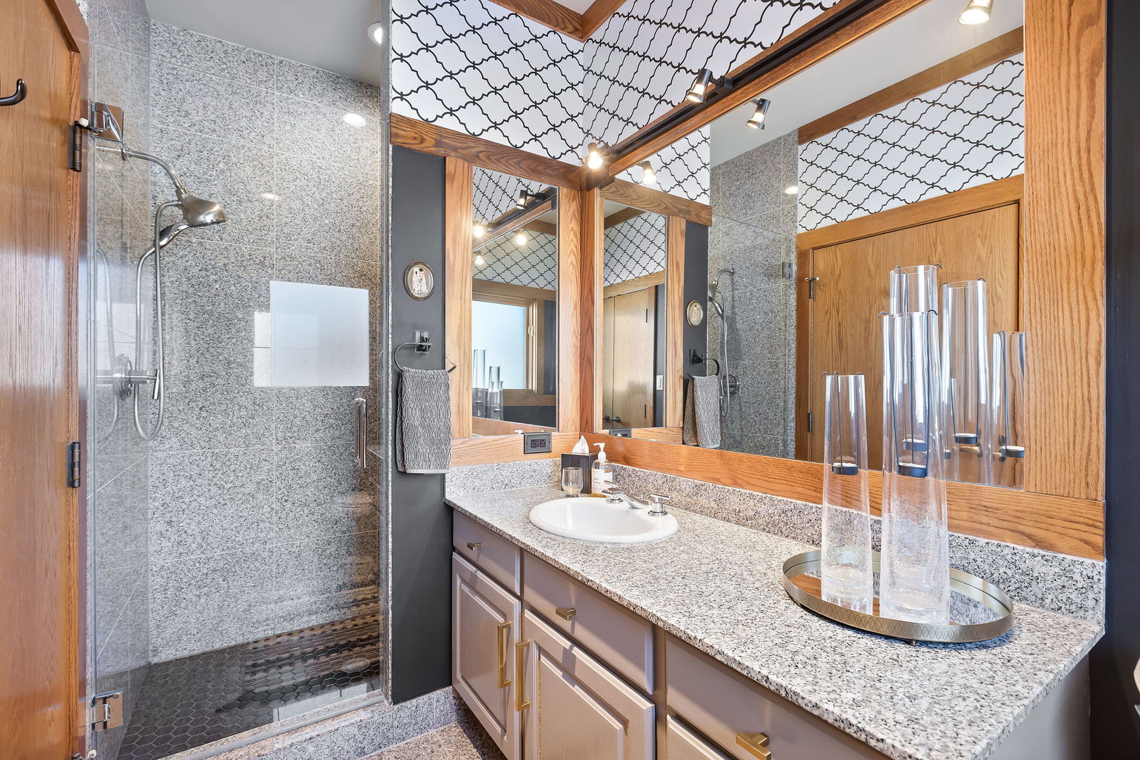 13540 McCarthy Road Lemont, IL 60439 - Photo 37 of 71 a bathroom with a granite countertop sink and a mirror