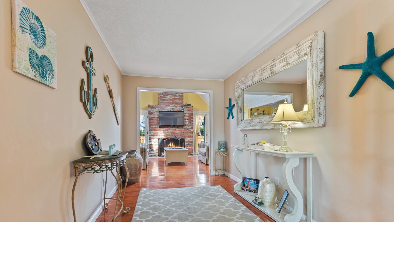 347 Highway 35 Mantoloking, NJ 08738 - Photo 3 of 5 a living room with furniture and a table