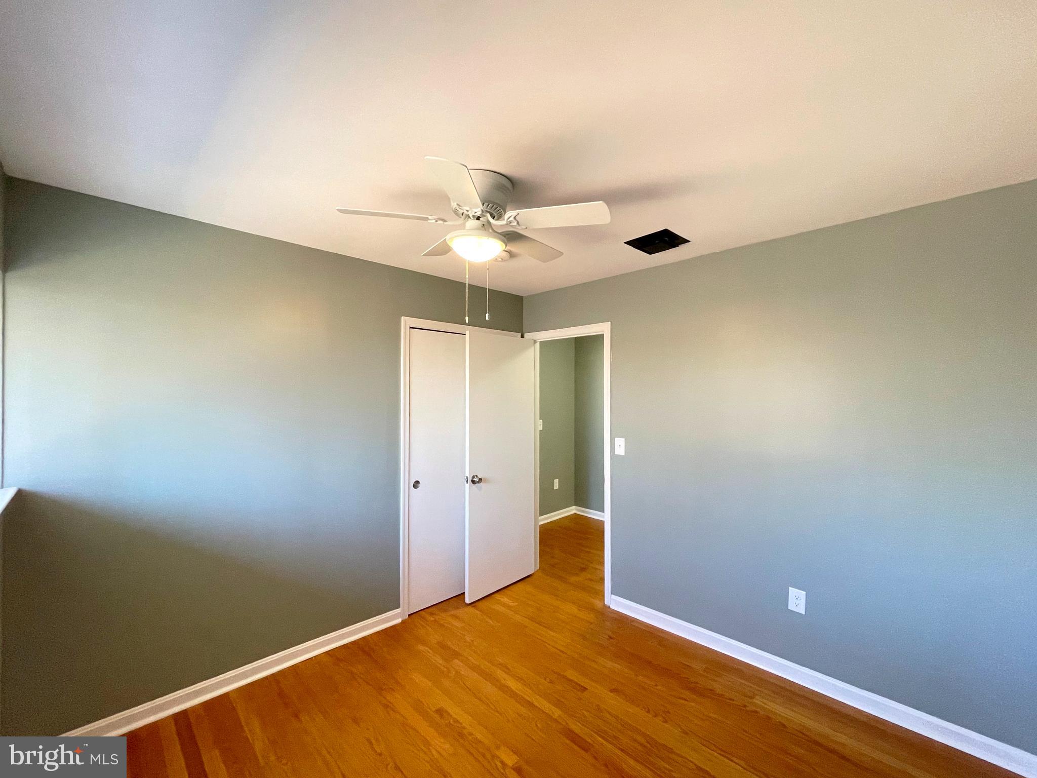 9457 Boyds Turn Road Owings, MD 20736 - Photo 17 of 46 a view of a room with a ceiling fan