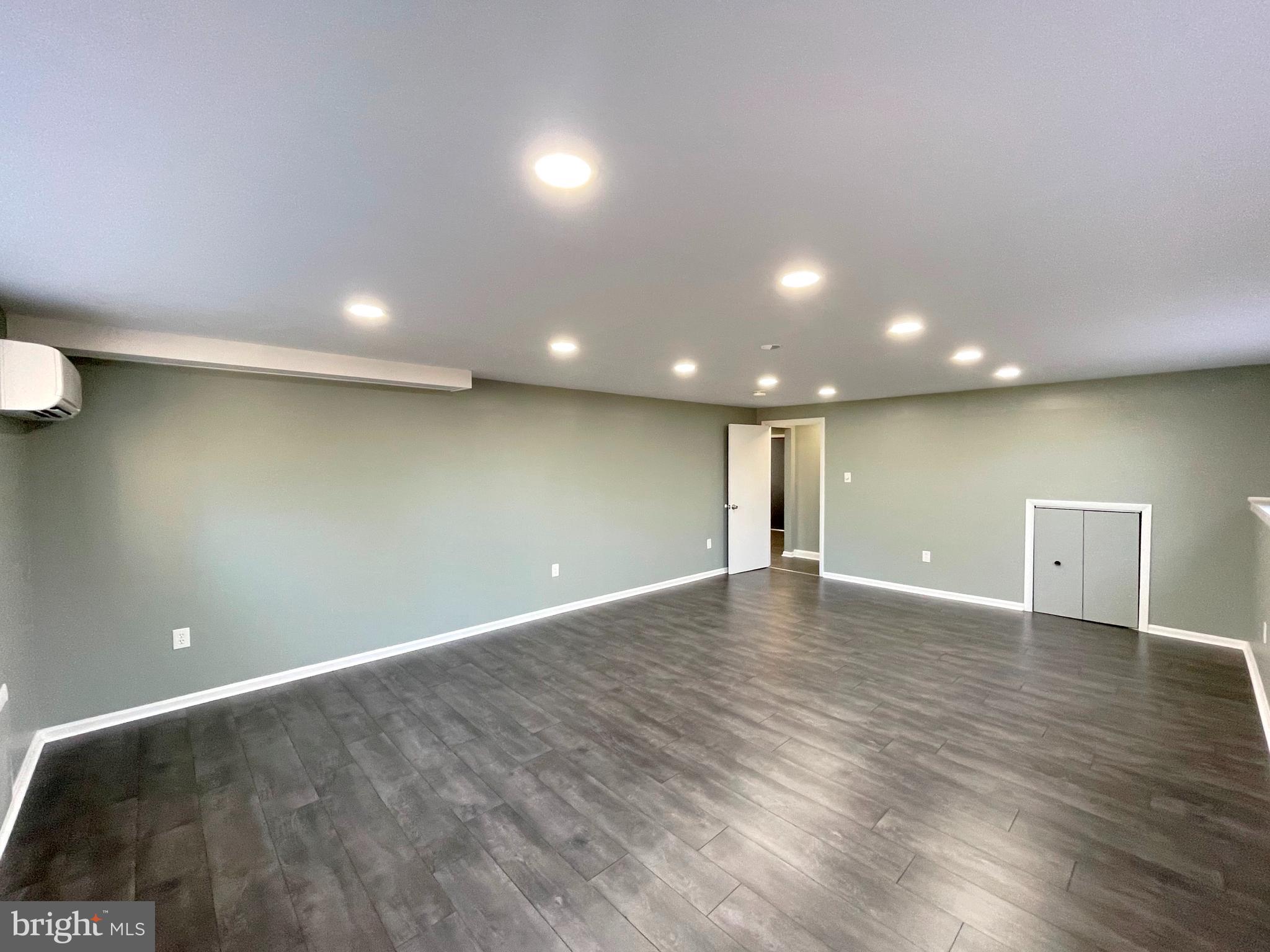 9457 Boyds Turn Road Owings, MD 20736 - Photo 28 of 46 a view of an empty room with wooden floor