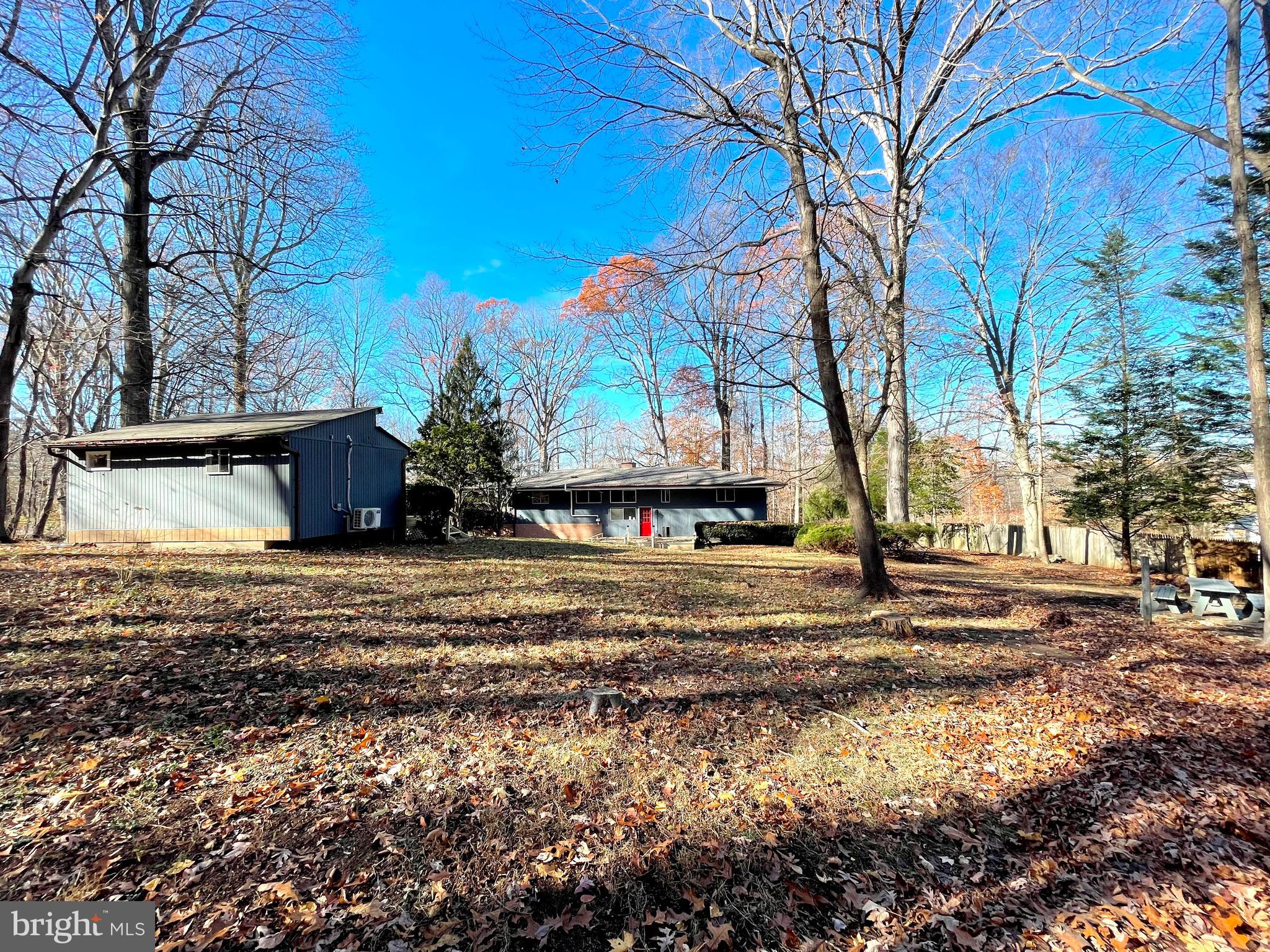 9457 Boyds Turn Road Owings, MD 20736 - Photo 40 of 46 a view of a house with snow on the side of the road