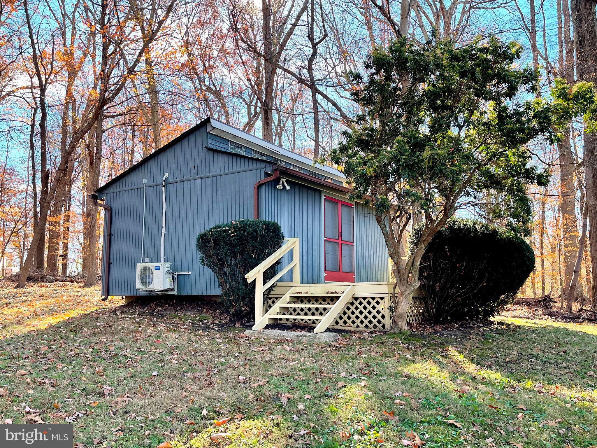 9457 Boyds Turn Road Owings, MD 20736 - Photo 42 of 46 a front view of a house with garden