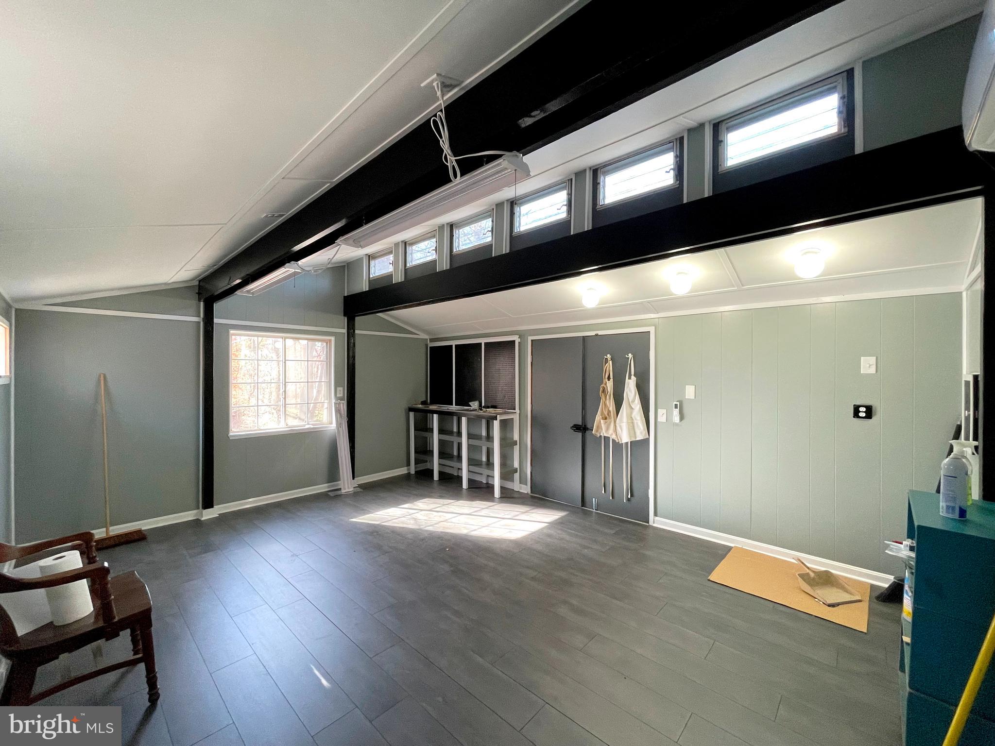 9457 Boyds Turn Road Owings, MD 20736 - Photo 44 of 46 a view of an empty room with wooden floor and a window