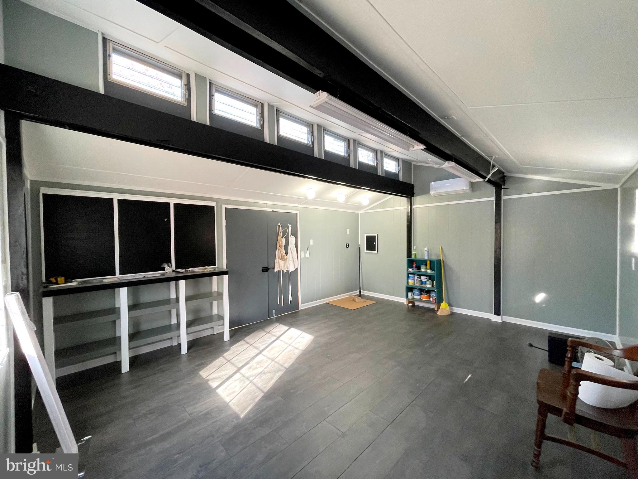 9457 Boyds Turn Road Owings, MD 20736 - Photo 45 of 46 a view of a hallway with wooden floor