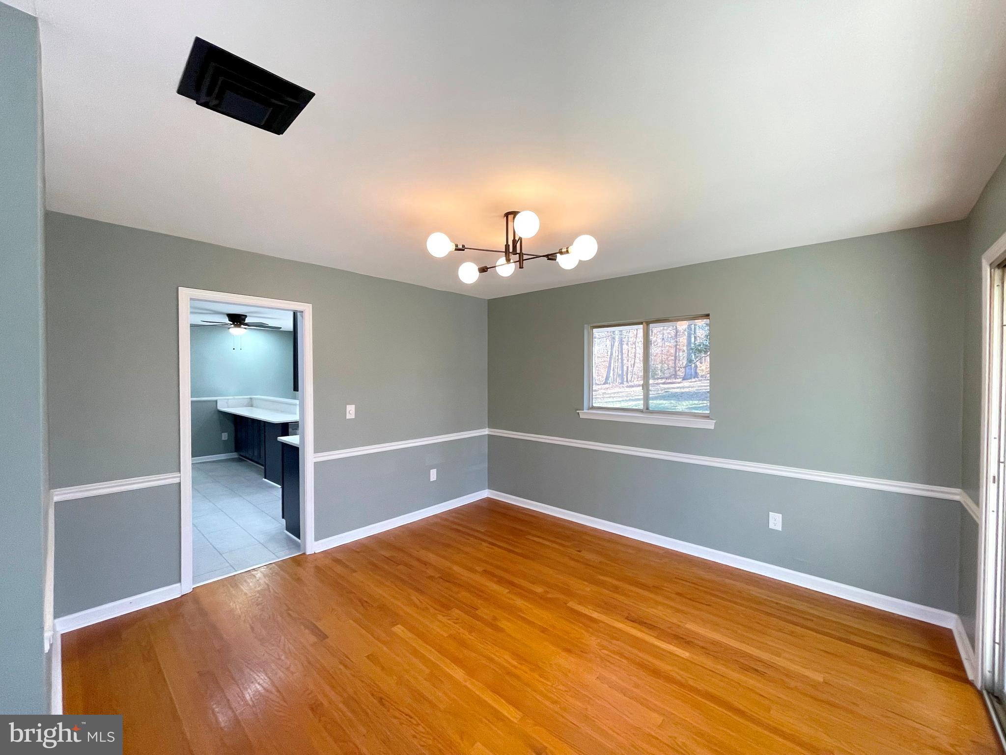 9457 Boyds Turn Road Owings, MD 20736 - Photo 10 of 46 a bedroom with a bed and a window