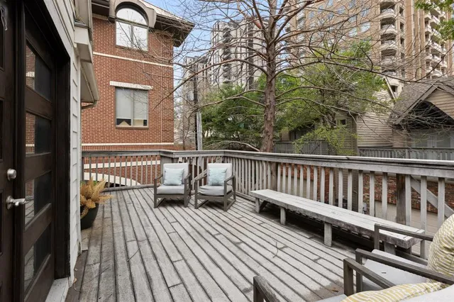 a view of balcony with furniture
