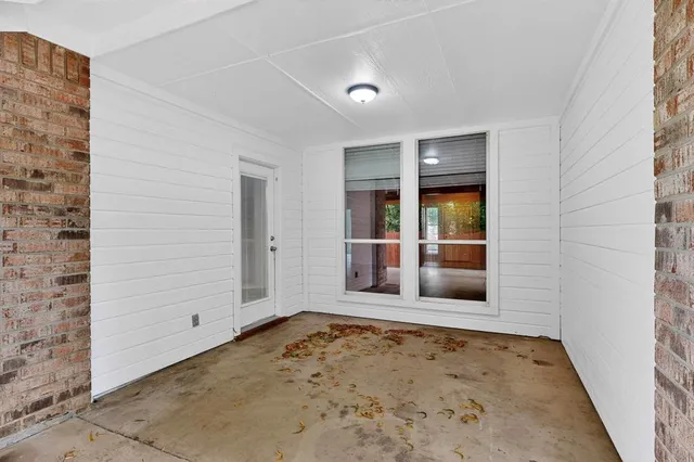 an empty room with window