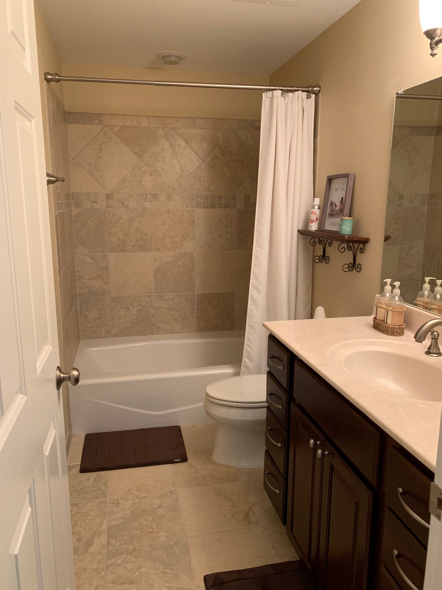 7100 Dale Ridge Road, Unit I2 Lancaster, TN 38569 - Photo 30 of 35 a bathroom with a granite countertop sink toilet and shower