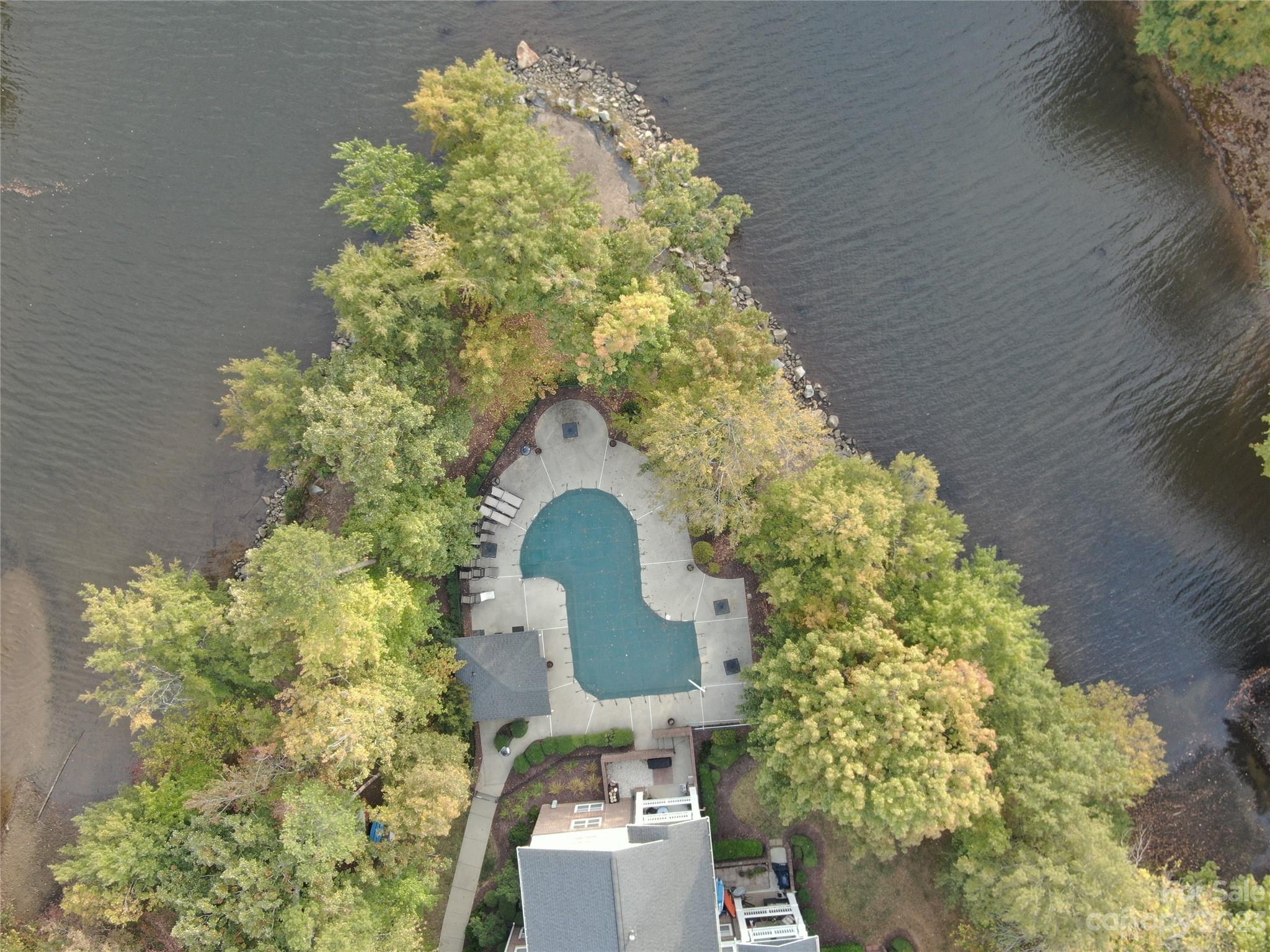 747 Peninsula Drive Davidson, NC 28036 - Photo 29 of 31 a bathroom with a sink mirror and toilet