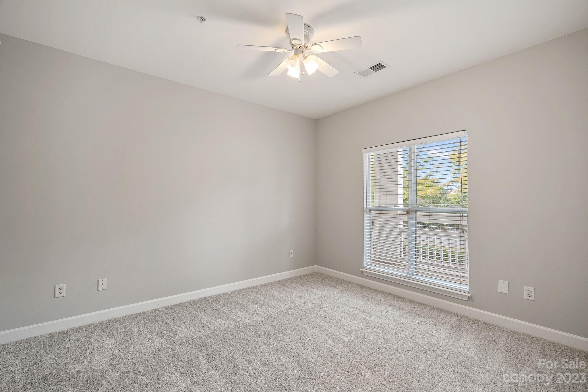 747 Peninsula Drive Davidson, NC 28036 - Photo 8 of 31 a view of an empty room with a window