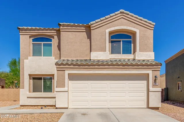 a view of the house with a door
