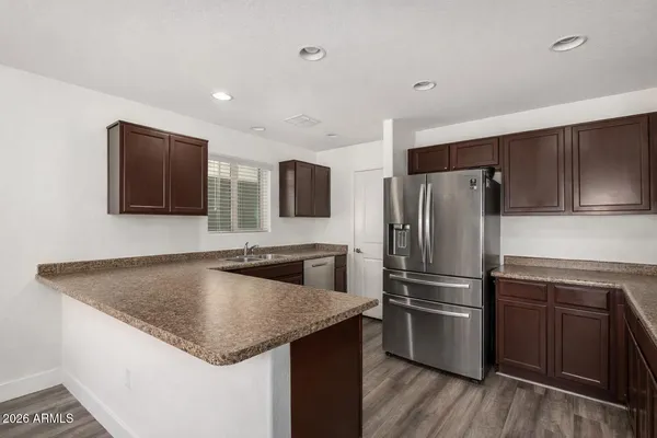 a kitchen with a stove and a microwave