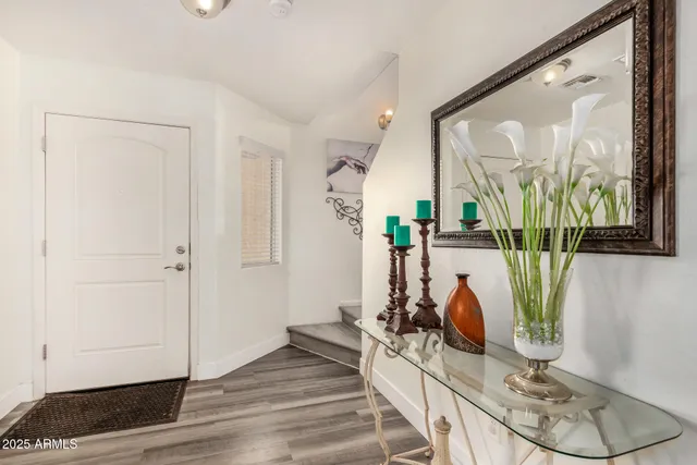 a view of a livingroom with furniture and window