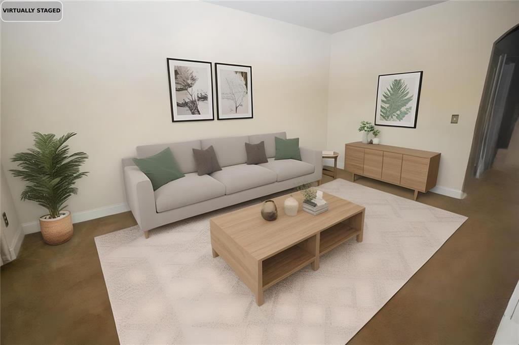 6074 Locklear Way Douglasville, GA 30134 - Photo 6 of 12 a living room with furniture and a couch