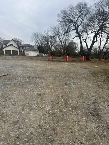 a view of road with trees
