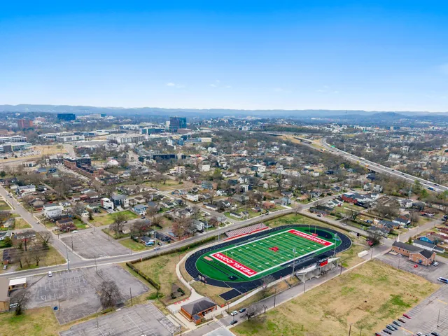 an aerial view of residential house with parking space