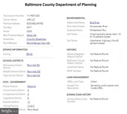 a book sitting on top of a tree in front of it