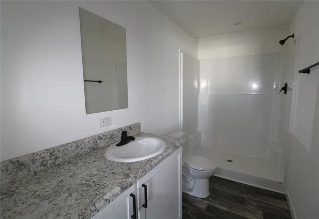 a view of a room with racks on the wall