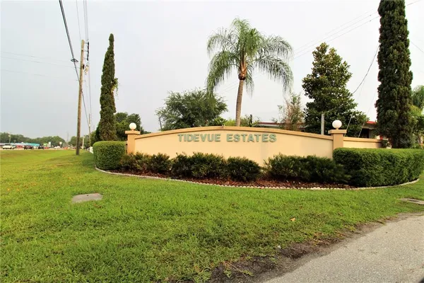 a view of swimming pool with sitting area