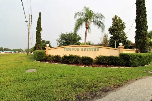 a view of swimming pool with sitting area