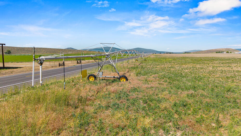 891 Cross Road Klamath Falls, OR 97603 - Photo 56 of 66 a view of a lake with a table and chairs