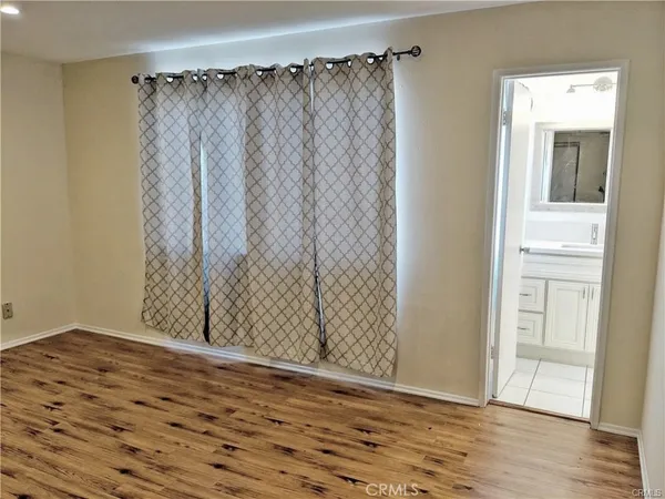 a bathroom with a sink a toilet and vanity