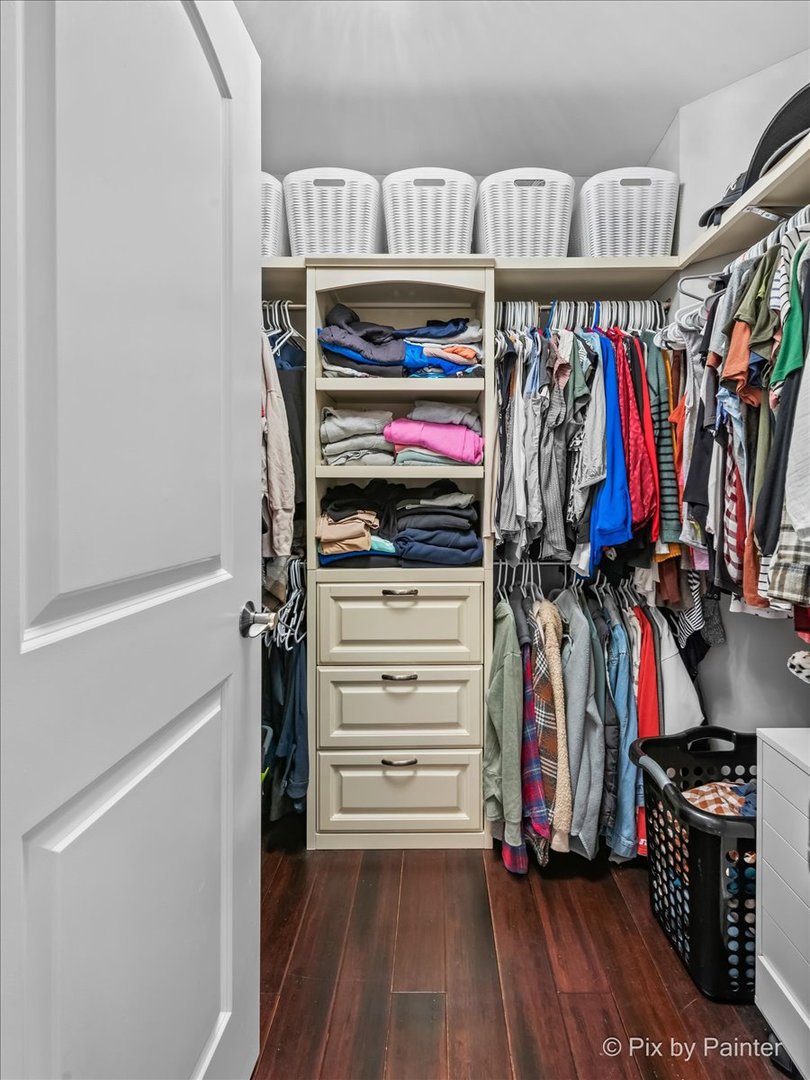 3503 High Ridge Road Carpentersville, IL 60110 - Photo 19 of 29 a view of walk in closet with clothes and shoes
