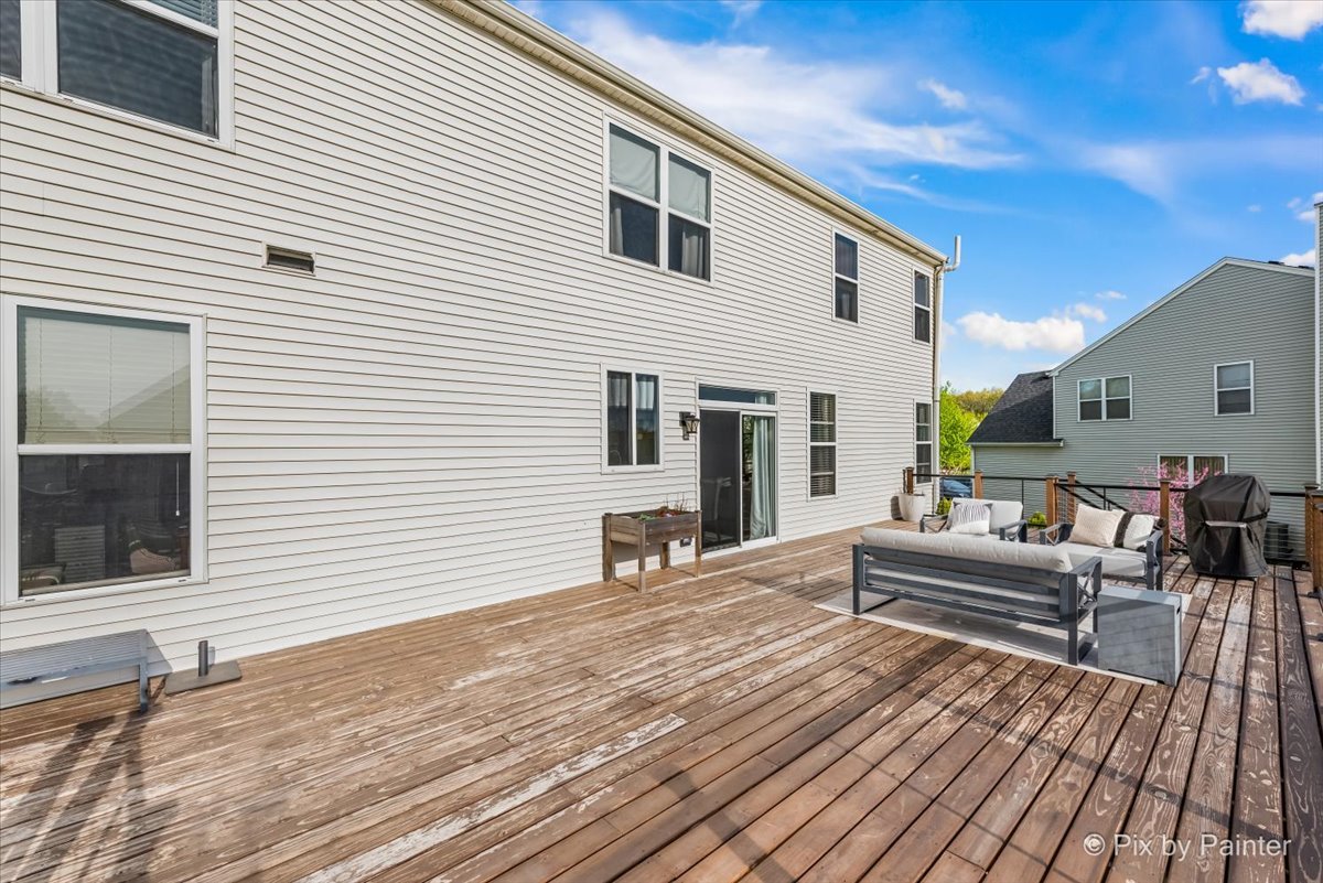3503 High Ridge Road Carpentersville, IL 60110 - Photo 25 of 29 a view of a house with wooden deck