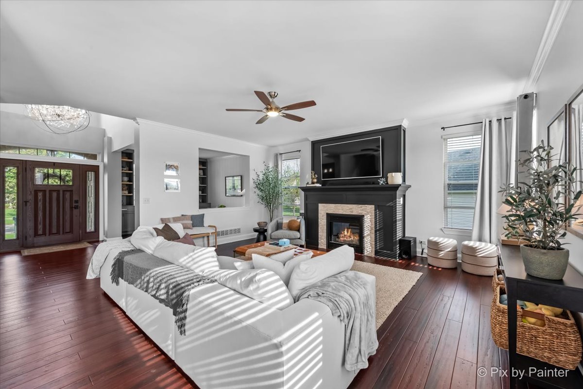 3503 High Ridge Road Carpentersville, IL 60110 - Photo 9 of 29 a large bedroom with bed and a fireplace