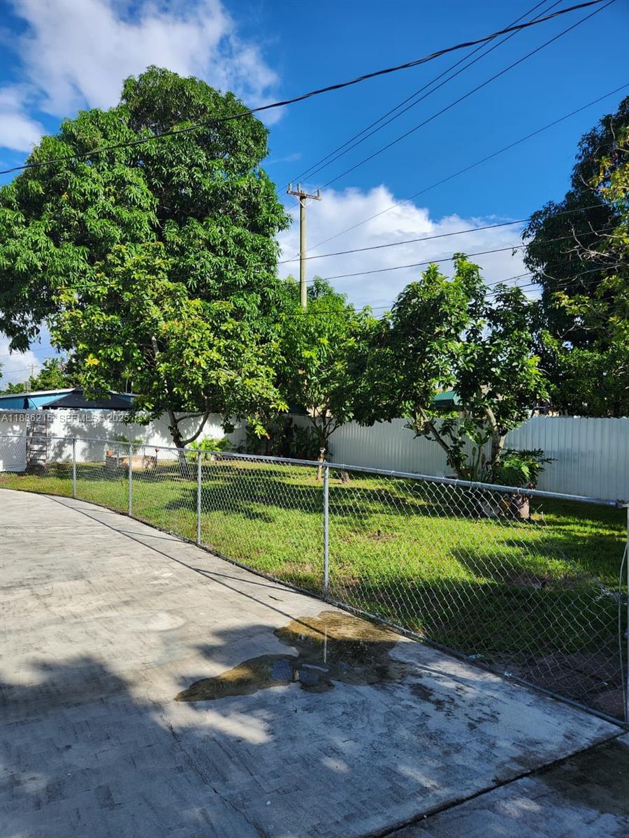 614 East 56th Street Hialeah, FL 33013 - Photo 31 of 78 a view of a park with large trees
