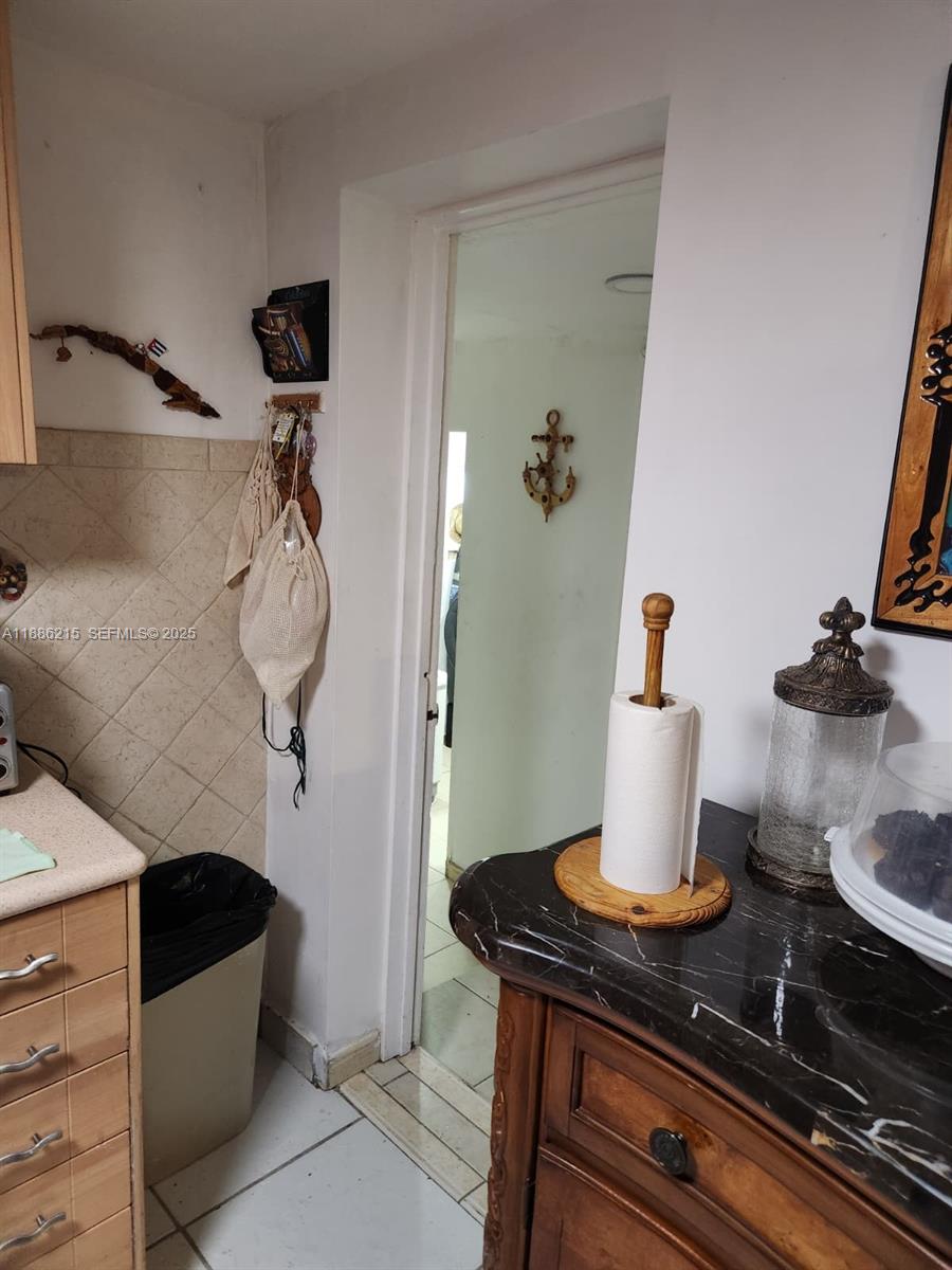 614 East 56th Street Hialeah, FL 33013 - Photo 66 of 78 a bath room with a sink and tub