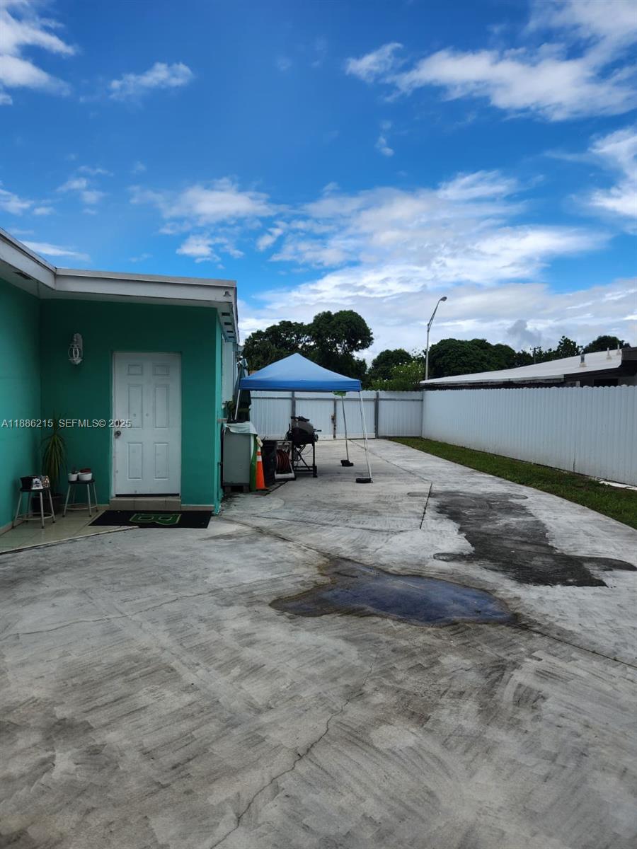 614 East 56th Street Hialeah, FL 33013 - Photo 71 of 78 a view of a lake with a car parked