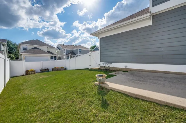 a view of a backyard with a garden