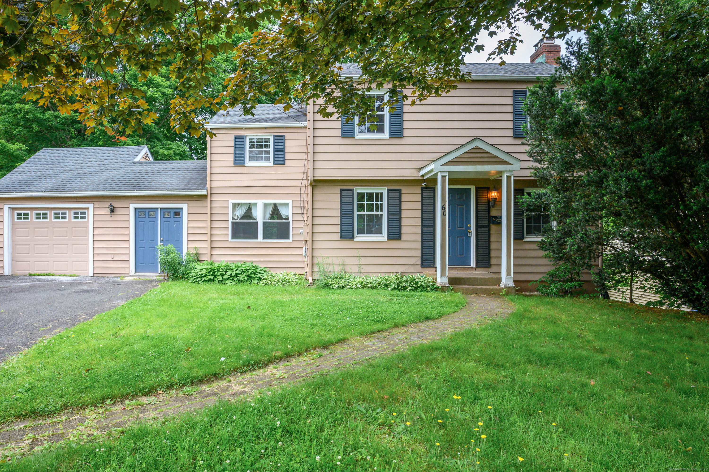 front view of a house and a yard
