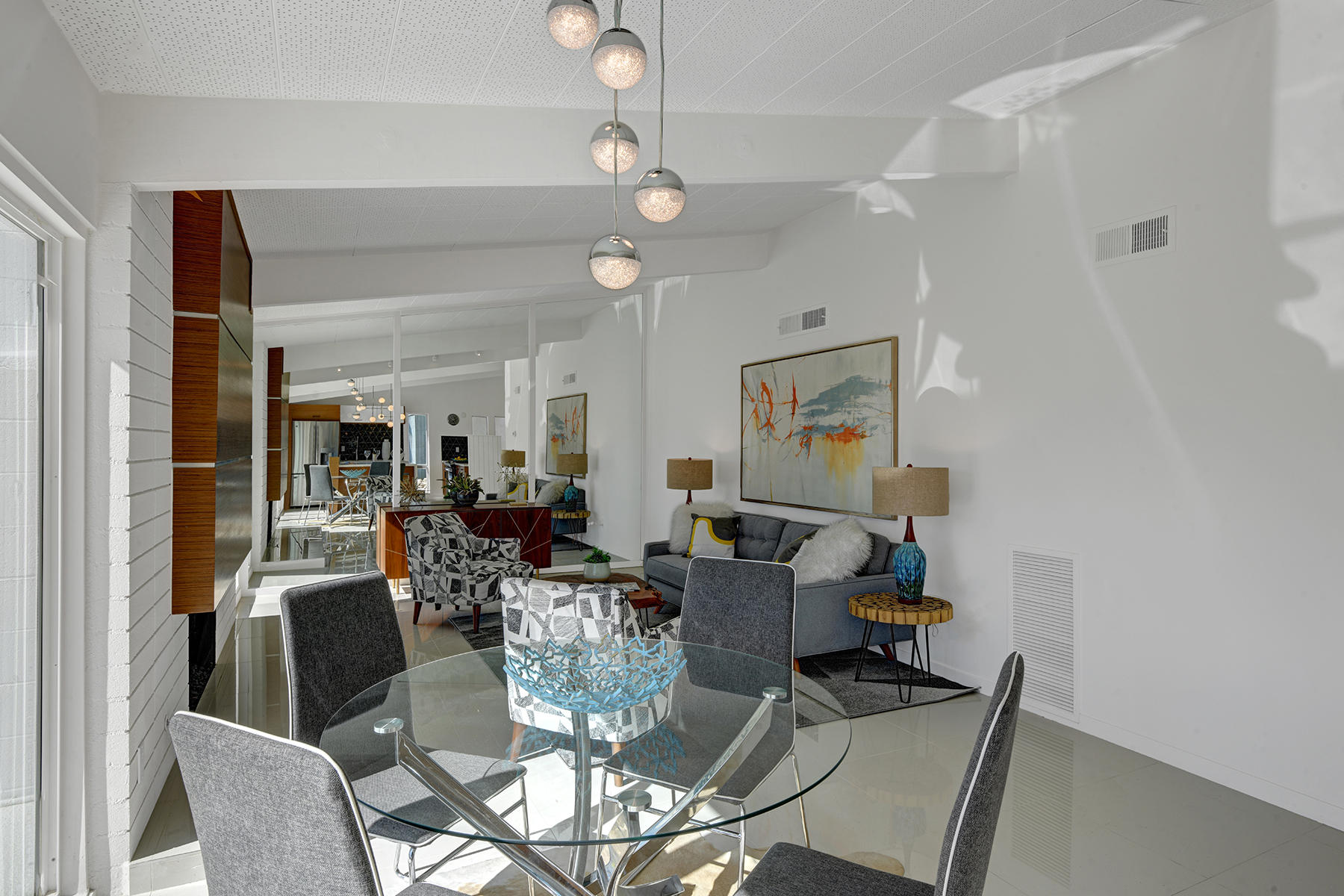 909 East Sunair Road Palm Springs, CA 92262 - Photo 12 of 39 DINING ROOM TO LIVING ROOM MLS