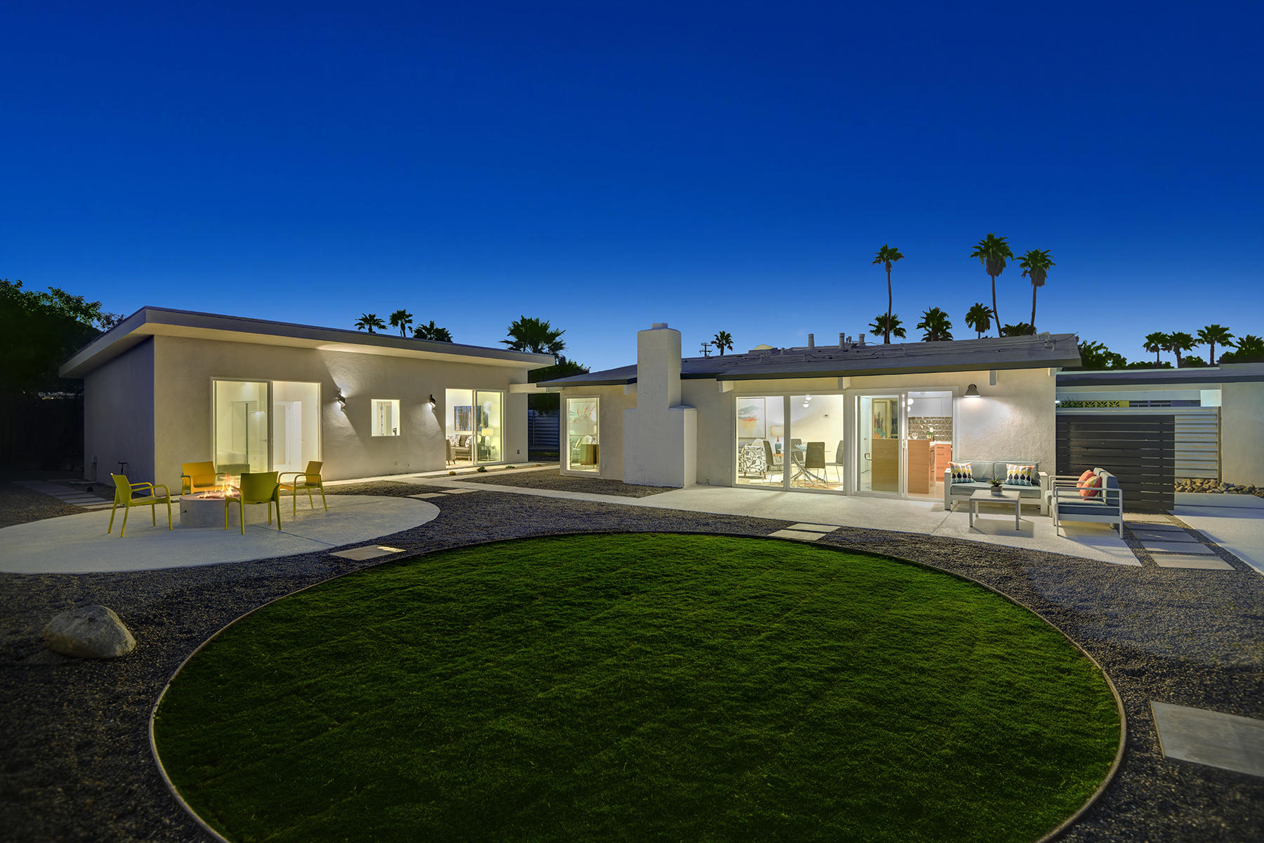 909 East Sunair Road Palm Springs, CA 92262 - Photo 32 of 39 ROUND GRASS AREA TO HOUSE AND CASITA NIG