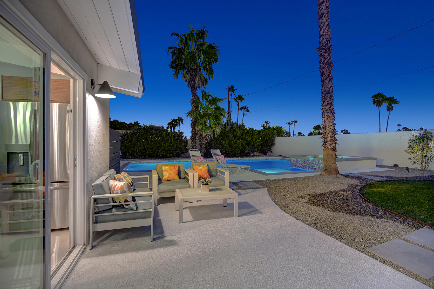 909 East Sunair Road Palm Springs, CA 92262 - Photo 34 of 39 BACK PATIO TO POOL NIGHT MLS