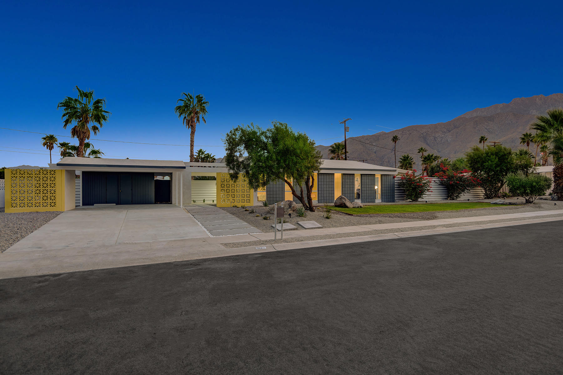 909 East Sunair Road Palm Springs, CA 92262 - Photo 39 of 39 FRONT OF HOUSE TO MOUNTAINS NIGHT MLS